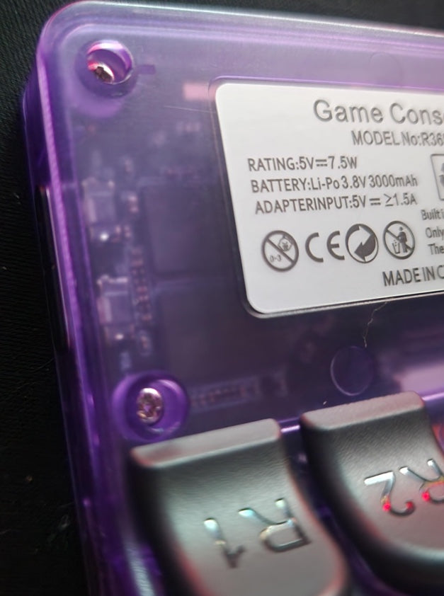 R36S handheld console rear label and rating details